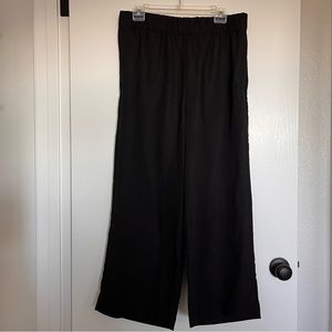 H&M linen pants. Elastic waist with pockets. Wide straight leg. Black. sz Medium